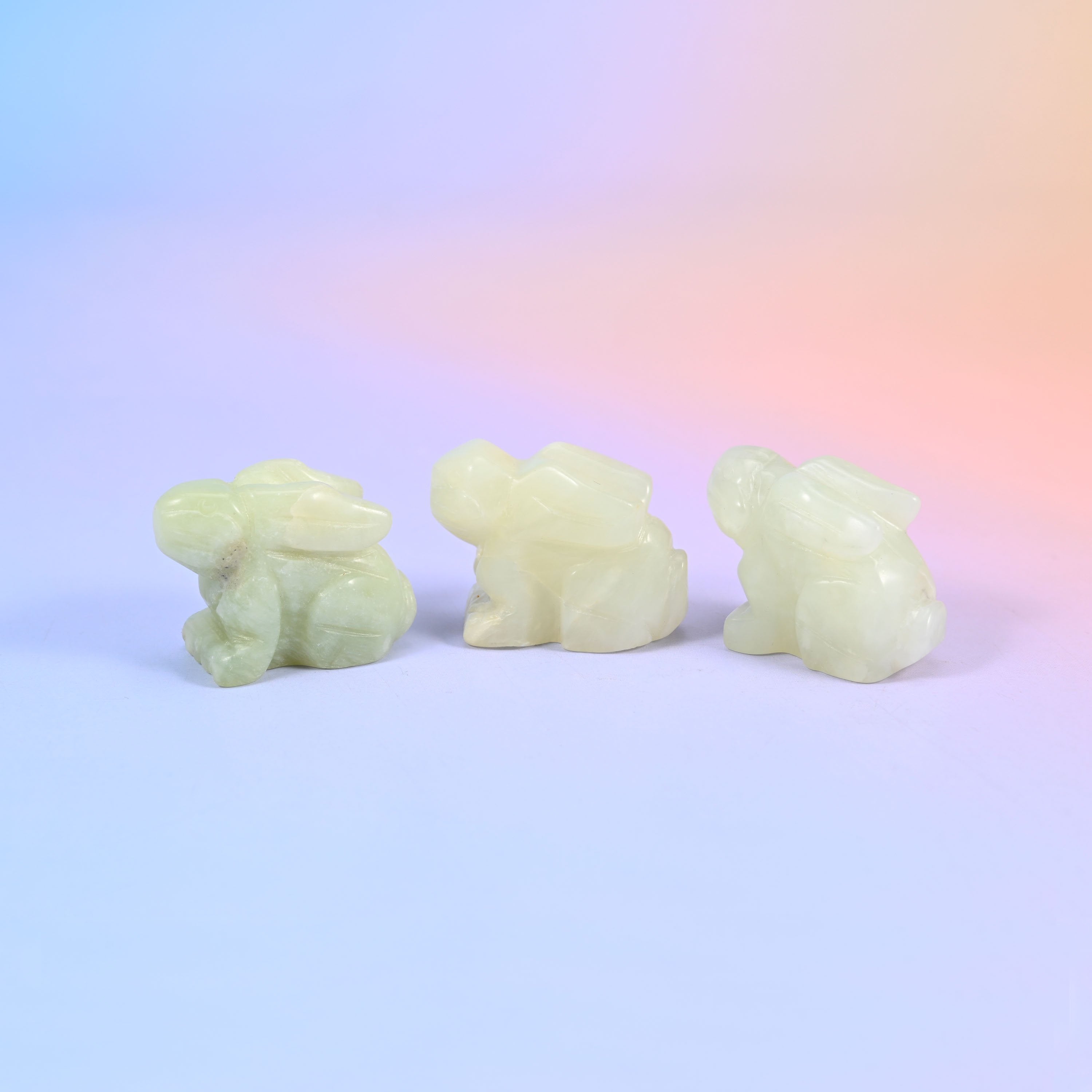 1.5 inch carved stone rabbit figurine, natural stone so veining and colour vary piece to piece