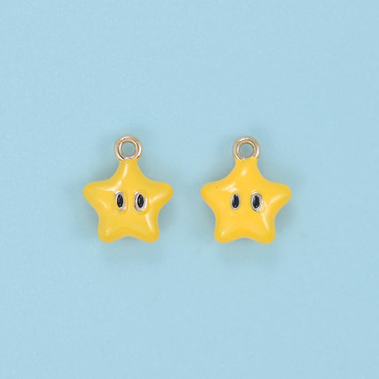Enamel Star Charm 14x8mm, gold-tone loop at the top point