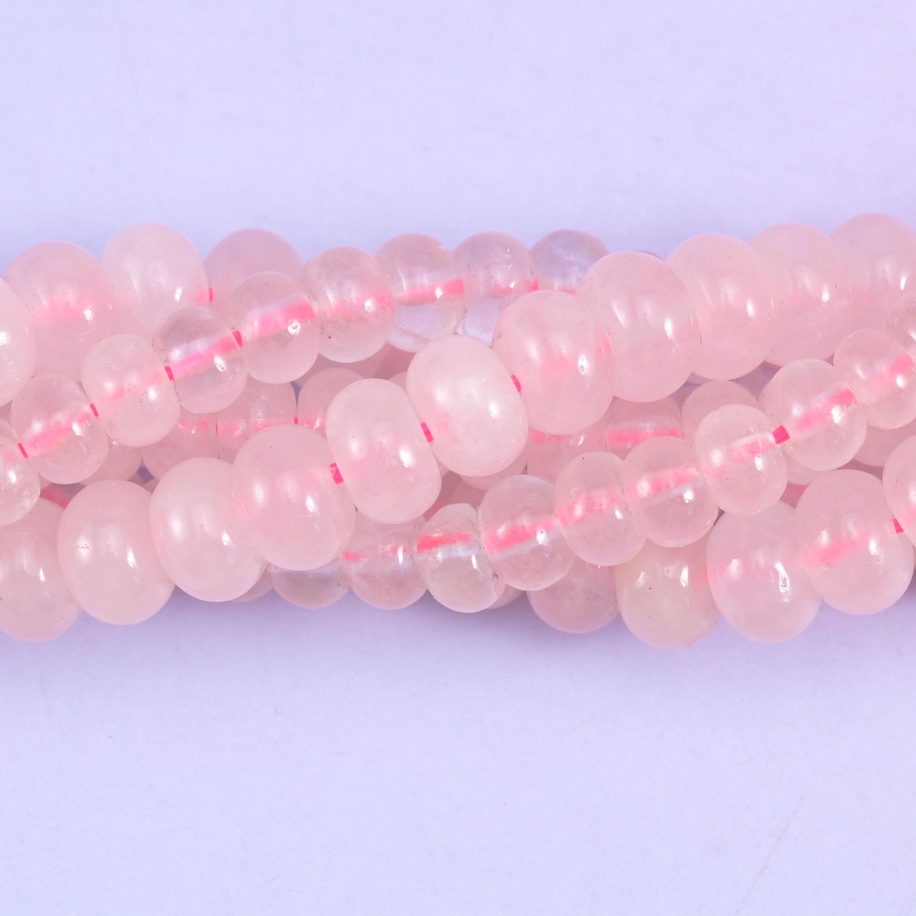 Rondelle cut Rose Quartz beads with a smooth polished finish