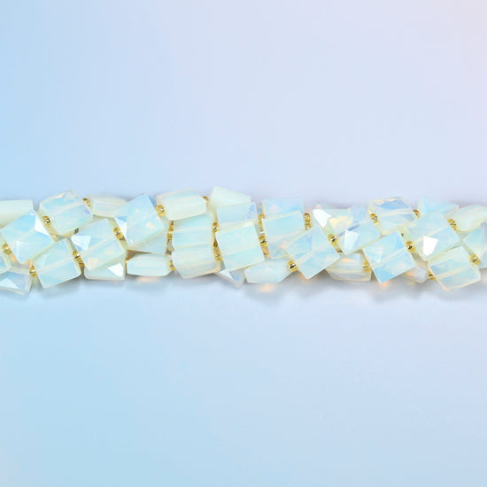 Strands of opalite faceted flat square beads twisted together in a horizontal row