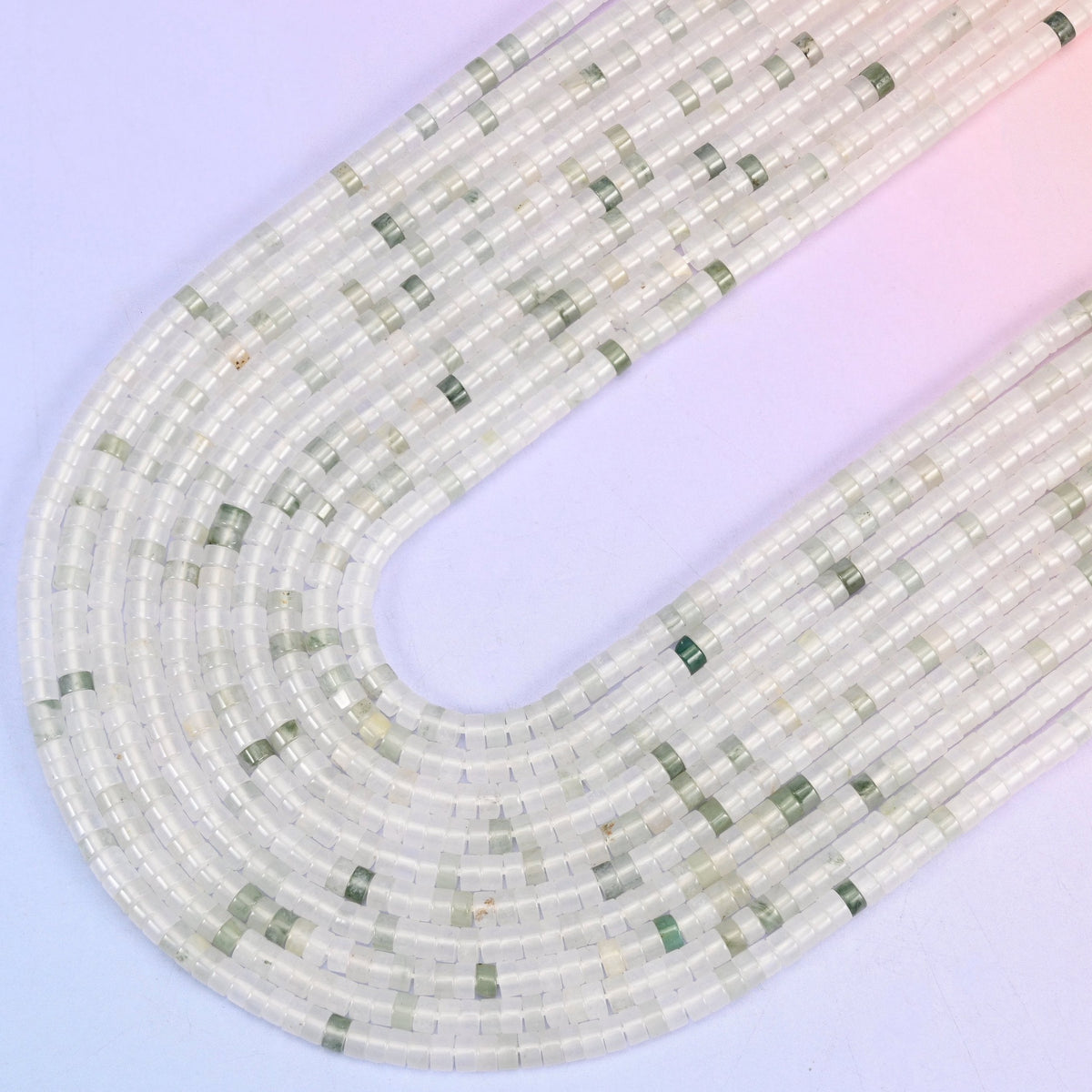 Tianshan Jade Smooth Heishi Disc Beads in soft milky white with sage-green accents
