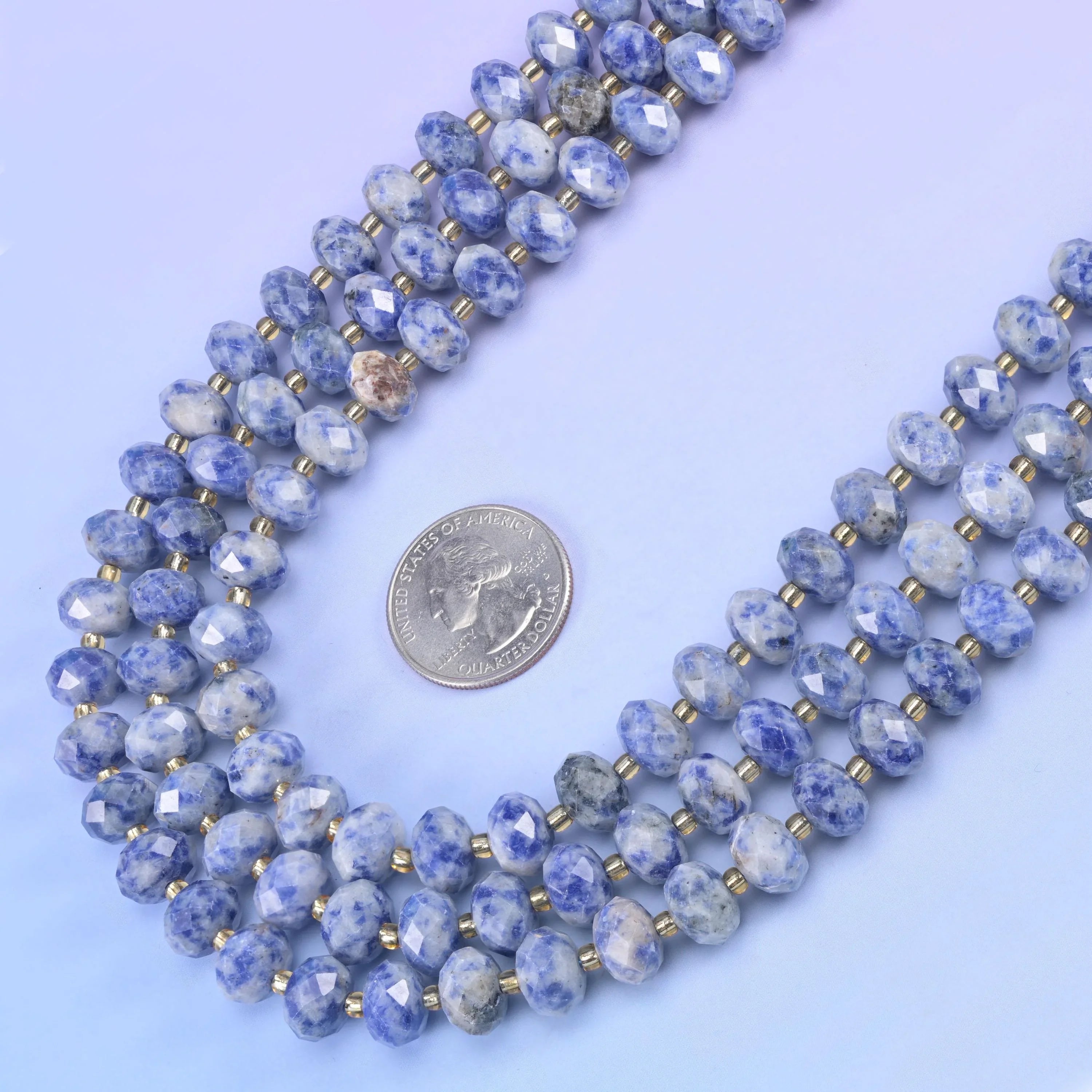 Blue Spot Jasper Faceted Rondelle Beads in pale grey-white with cornflower blue spotting