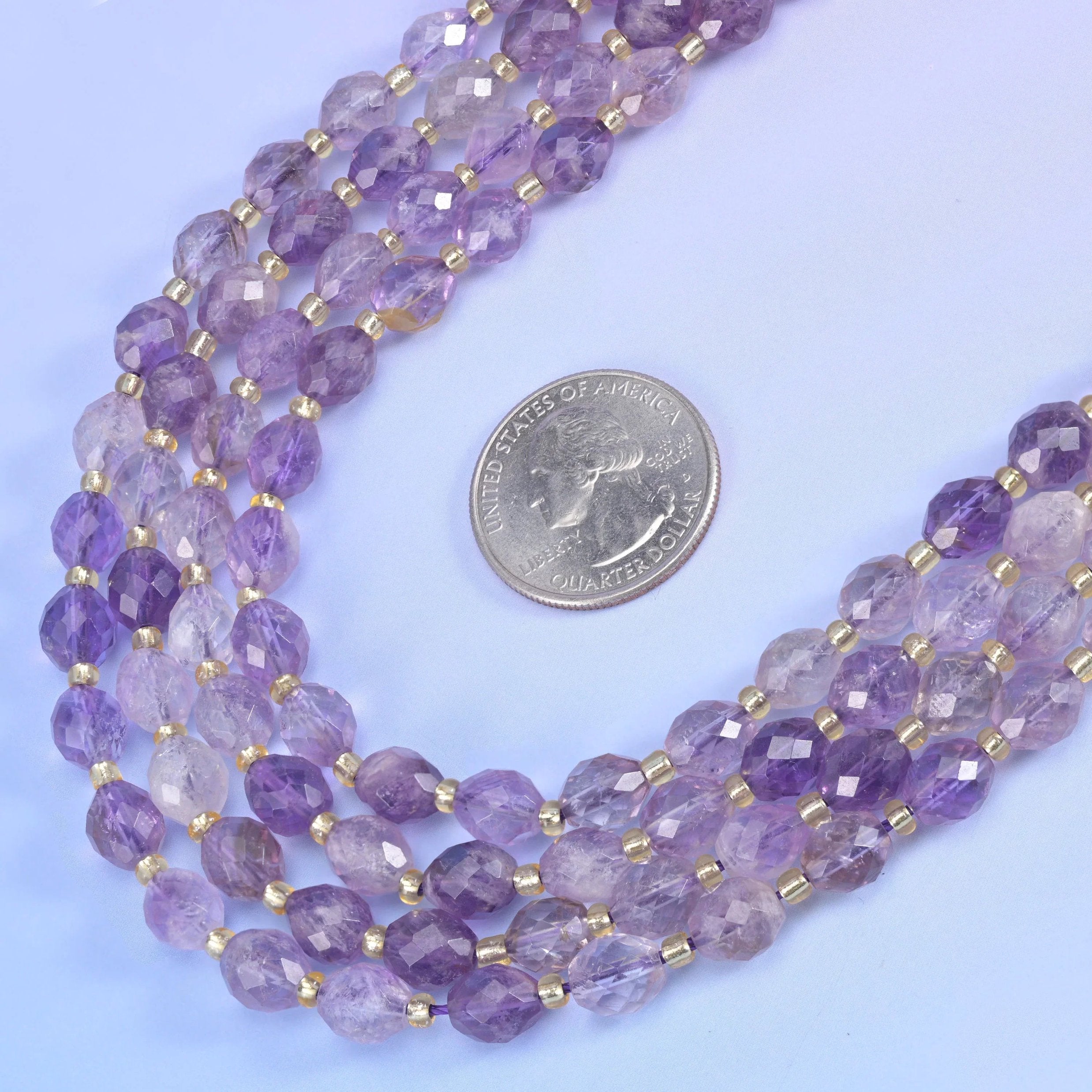 Amethyst rutilated quartz beads in soft violet with golden rutile needles