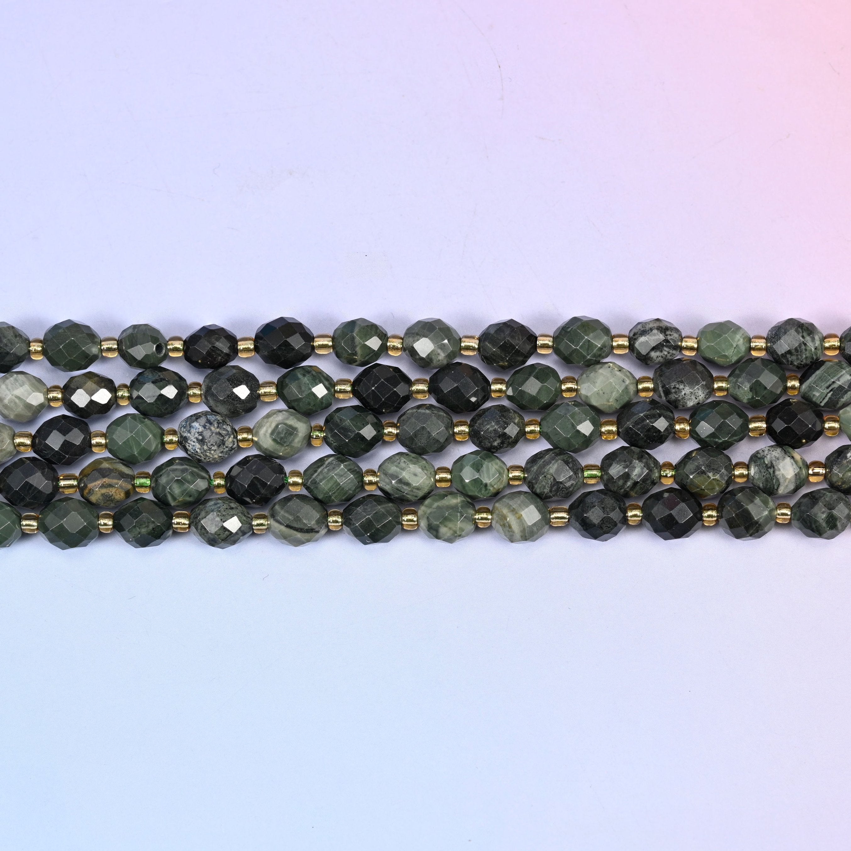 Kambaba jasper faceted rice barrel beads, approximately 39 beads per strand