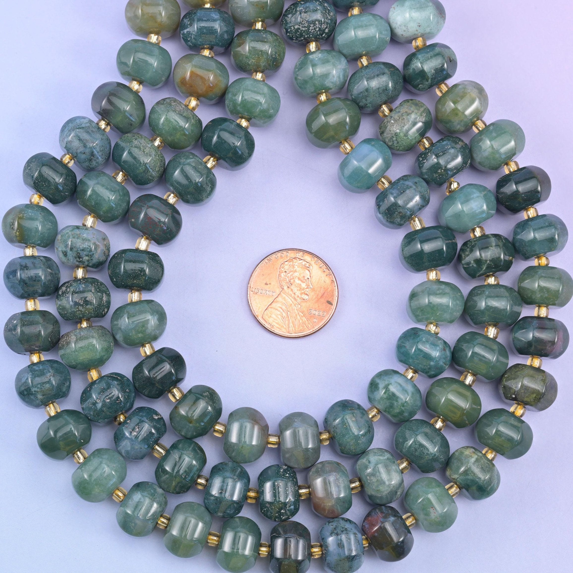 Moss agate smooth pumpkin beads in deep forest green with moss-like inclusions