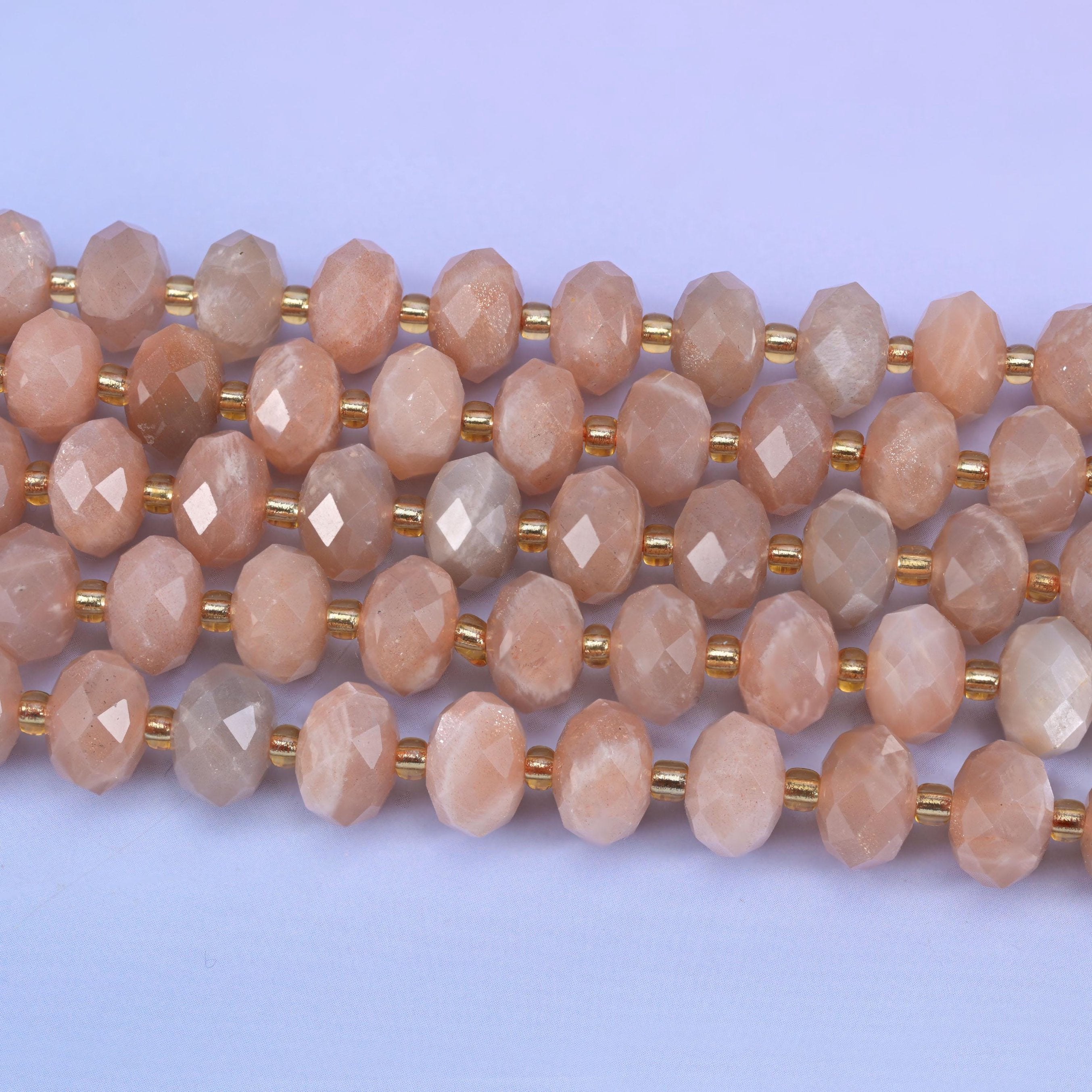 Faceted rondelle cut orange sunstone beads