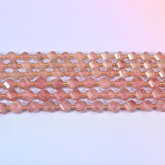 Strawberry Quartz beads in dusty rose flecked with fine silvery-red inclusions