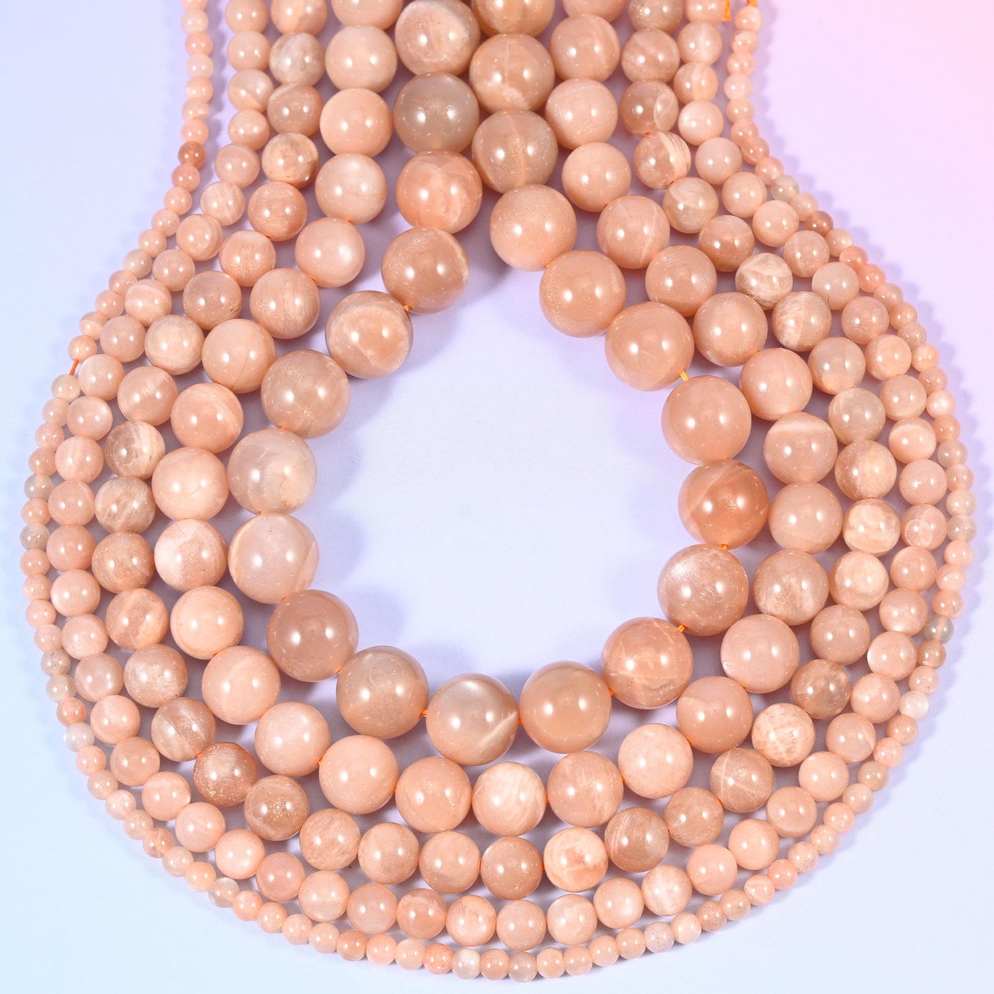 Peach Moonstone round beads, centre-drilled hole approximately 1.0mm to 1.2mm.