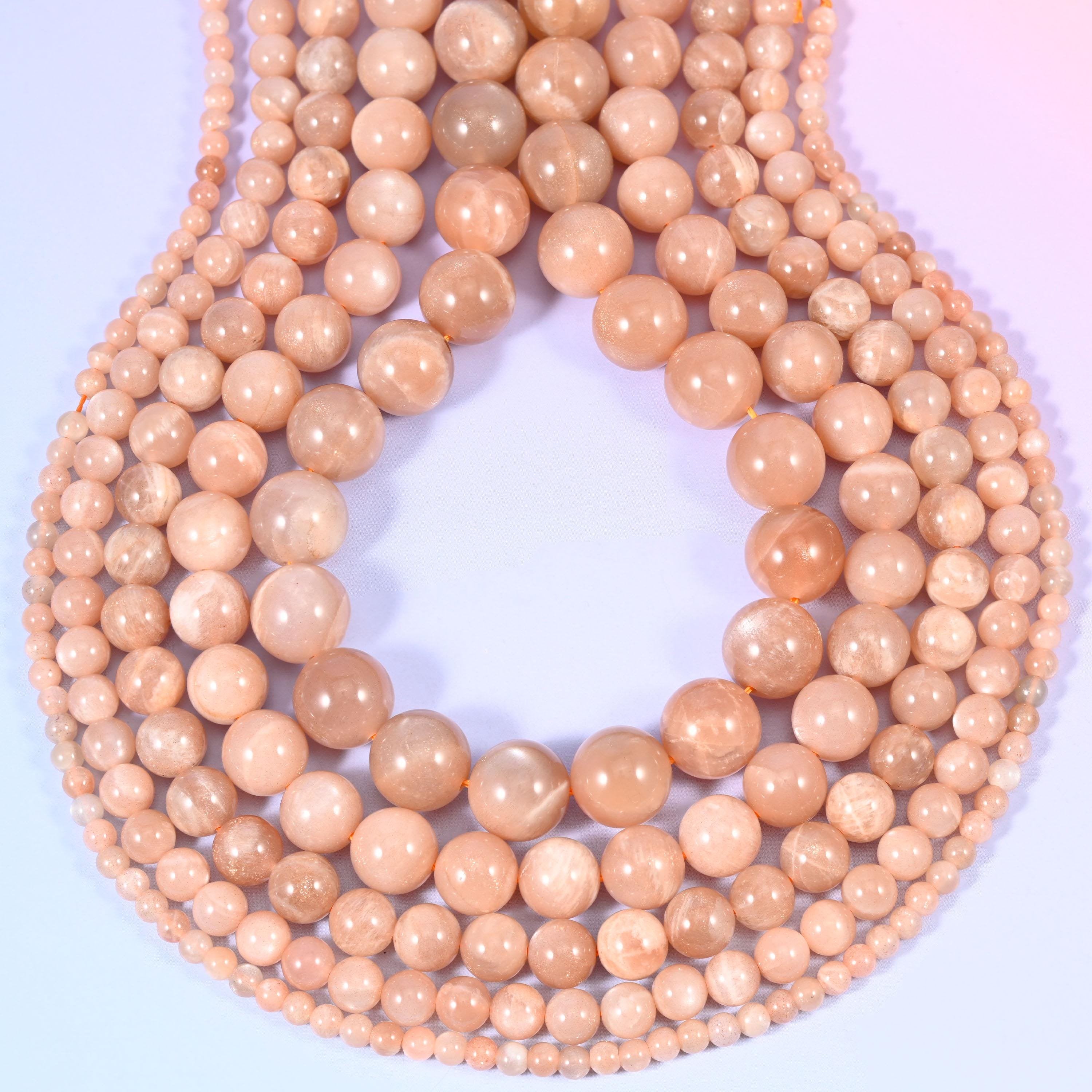 Peach Moonstone round beads, centre-drilled hole approximately 1.0mm to 1.2mm.