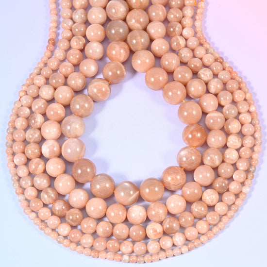 Peach Moonstone round beads, centre-drilled hole approximately 1.0mm to 1.2mm.