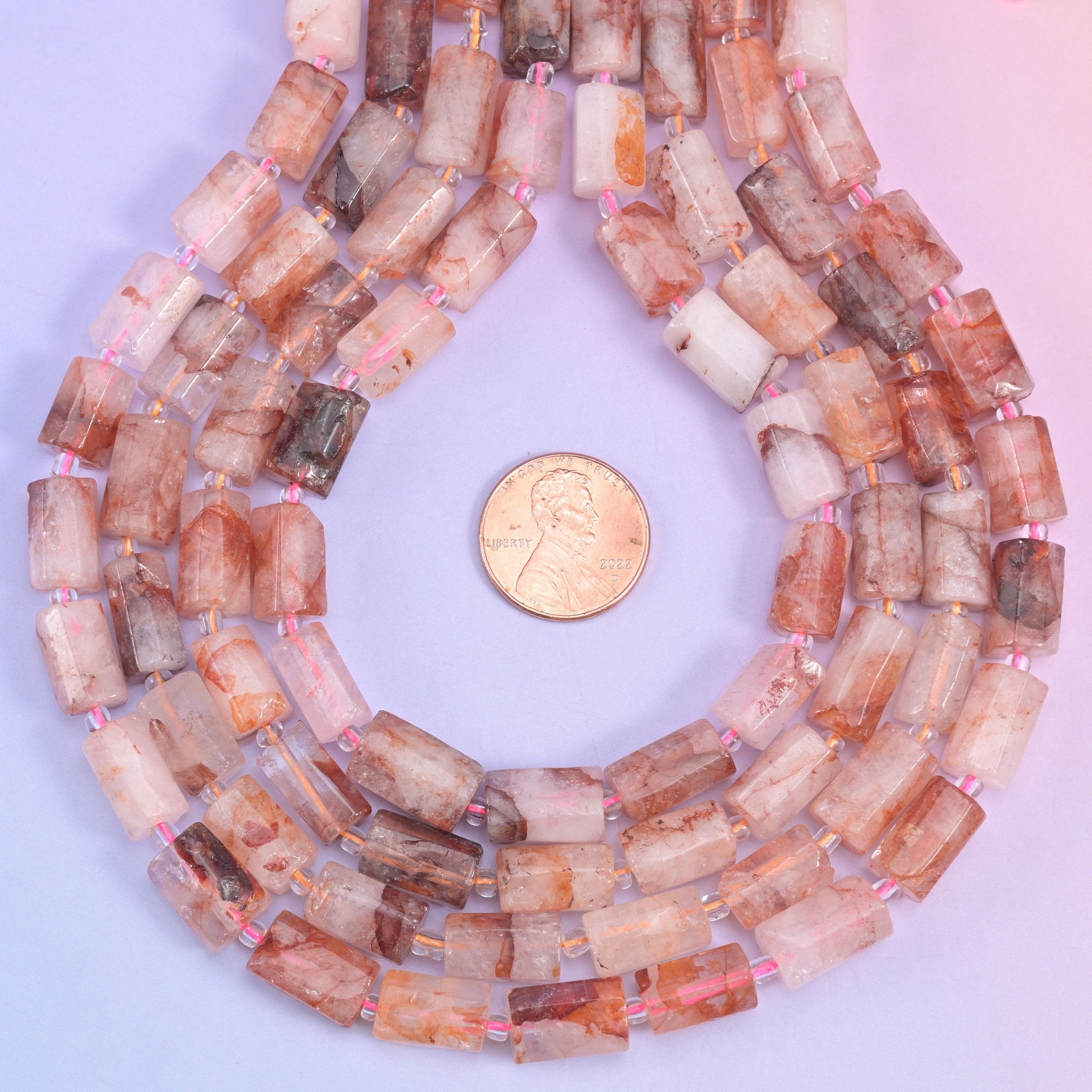 Natural Red Hematoid faceted tube beads with a sleek, elegant profile