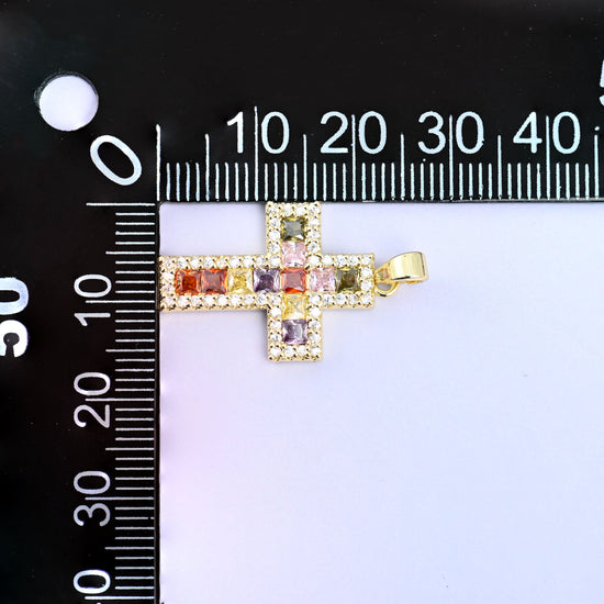 Zirconia cross charm measured at 16.29mm wide and 2.47mm thick