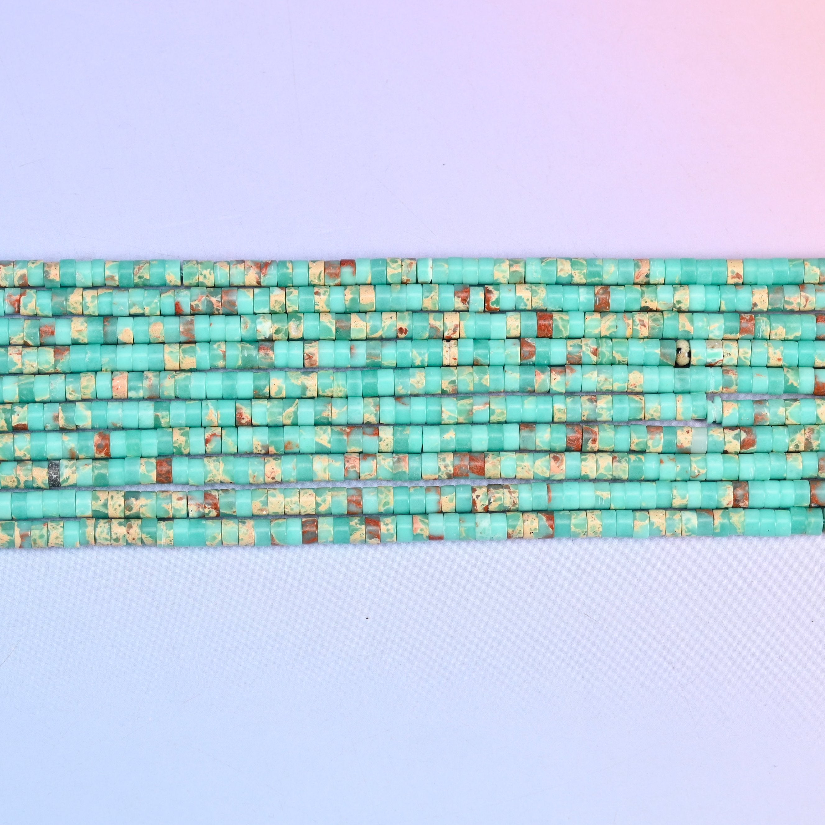 Blue Shoushan Stone Heishi Disc Beads 2x4mm in turquoise-green with rust-red and cream mottling