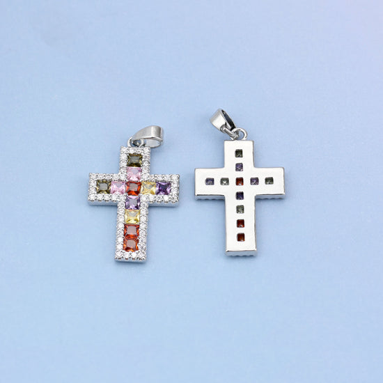 Zirconia cross charms in white gold plated brass, shown front and back with the open-back setting