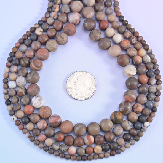 Matte round cut petrified wood beads
