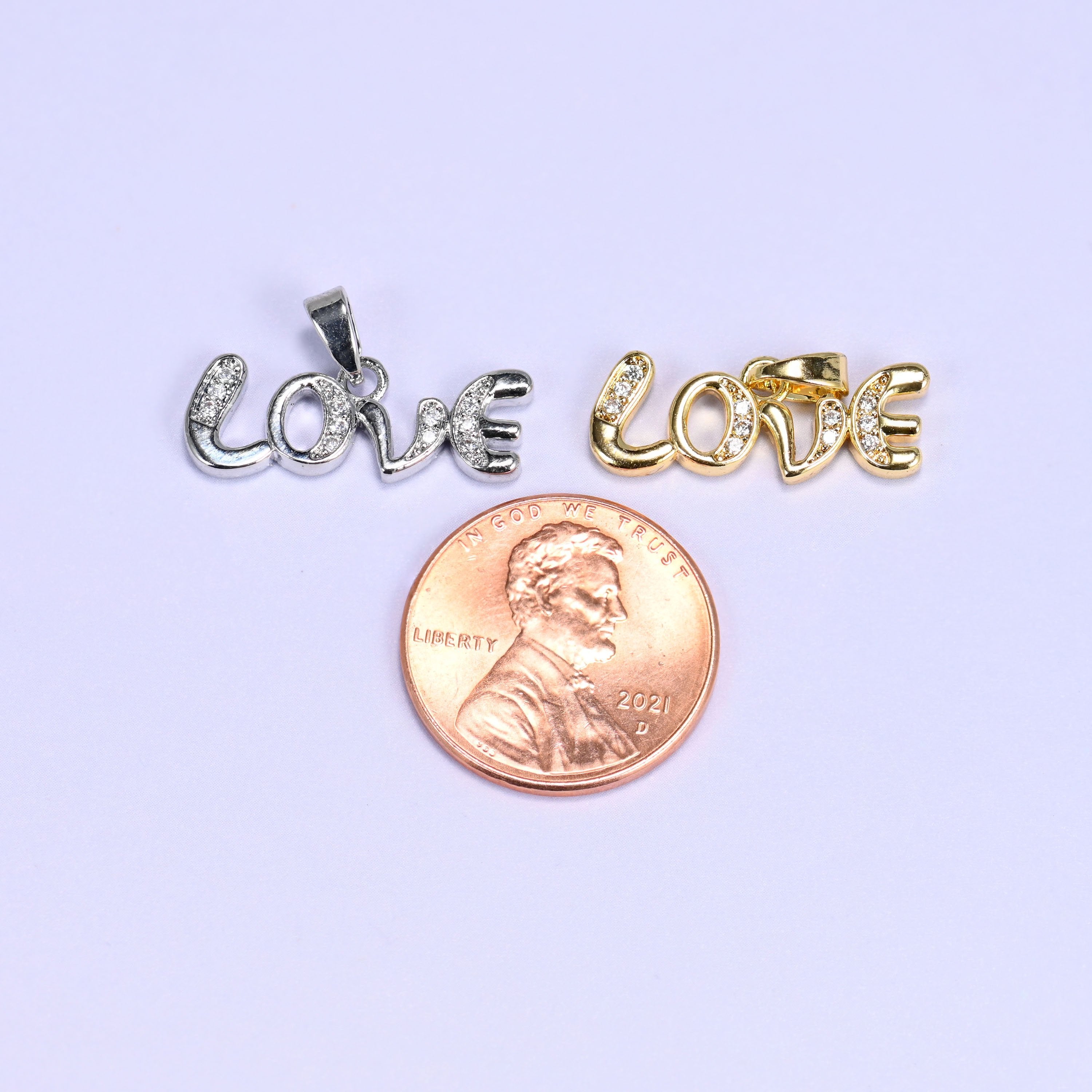 Cursive Love script charm with zircon pave accents