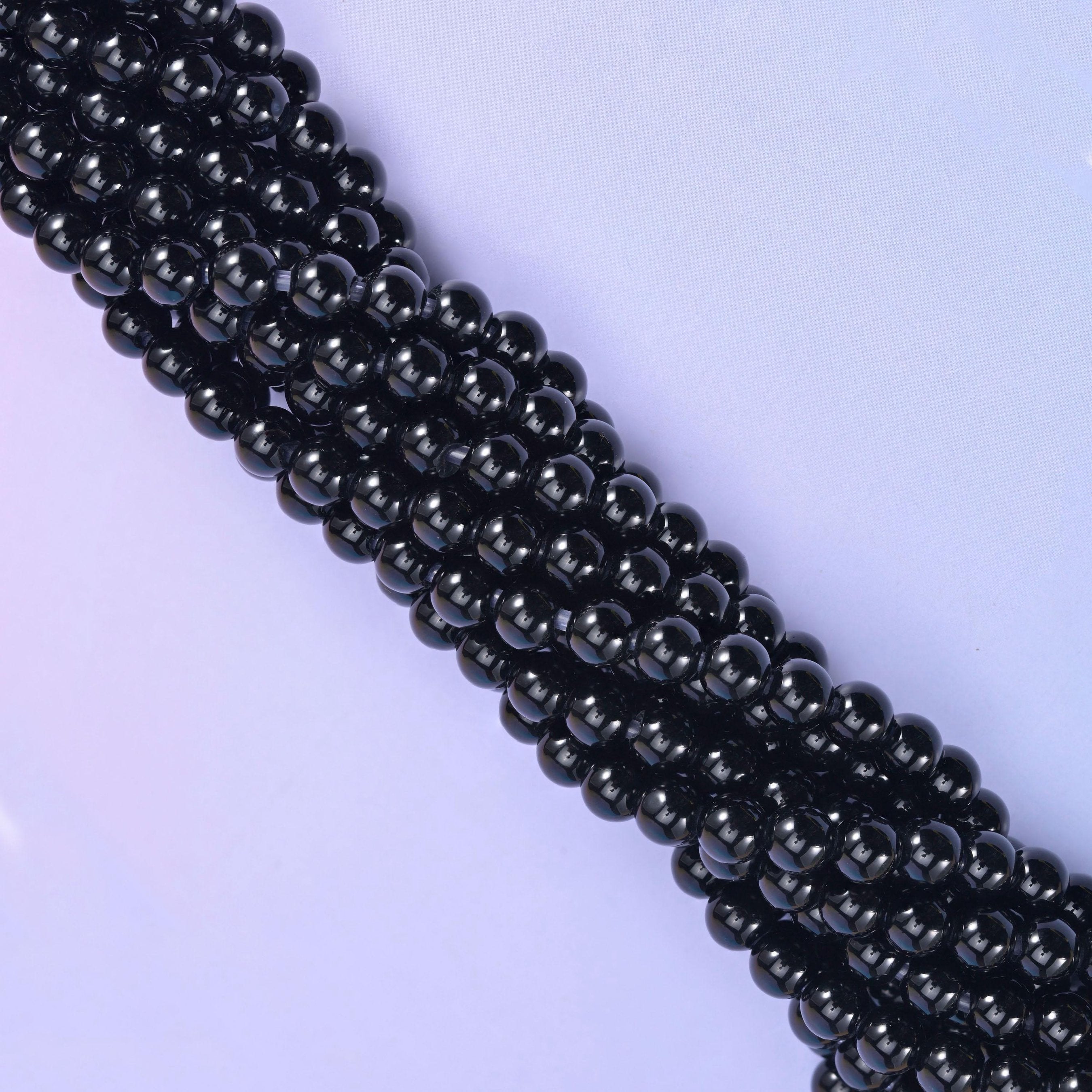 Smooth round cut black onyx beads