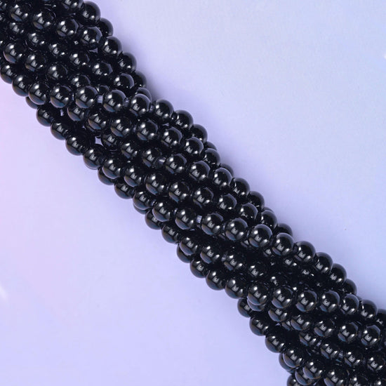 Smooth round cut black onyx beads