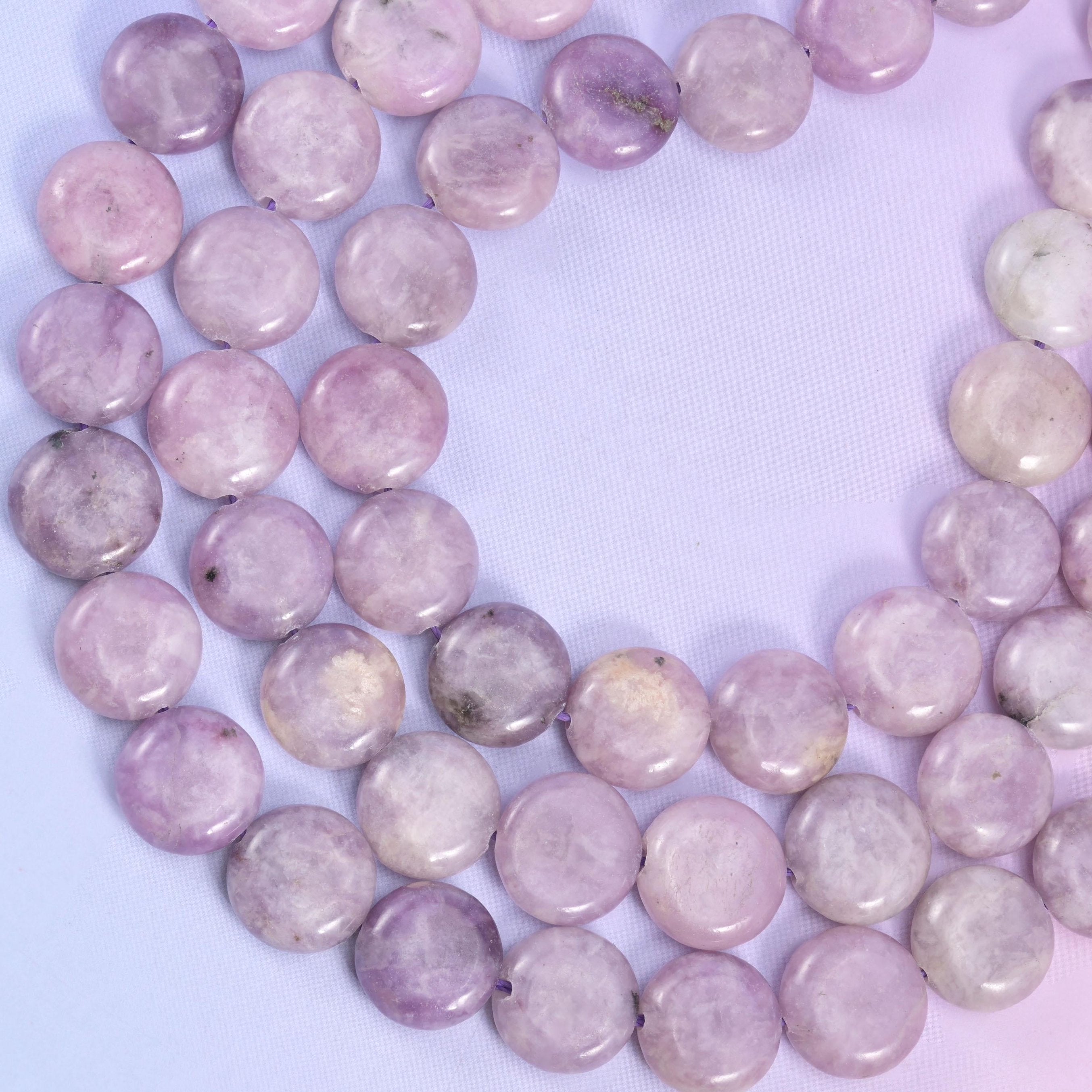 Lepidolite coin beads, approximately 26 beads per strand