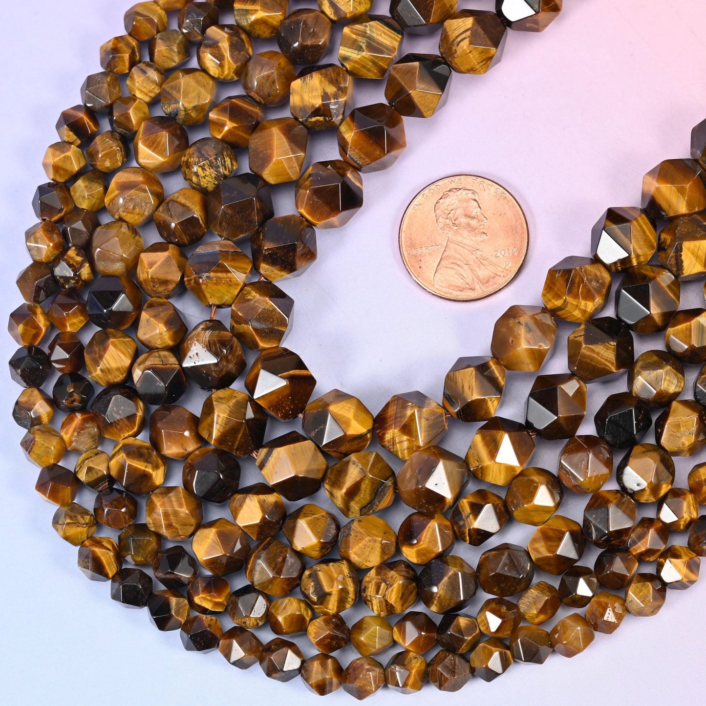 Faceted diamond star cut tiger eye beads