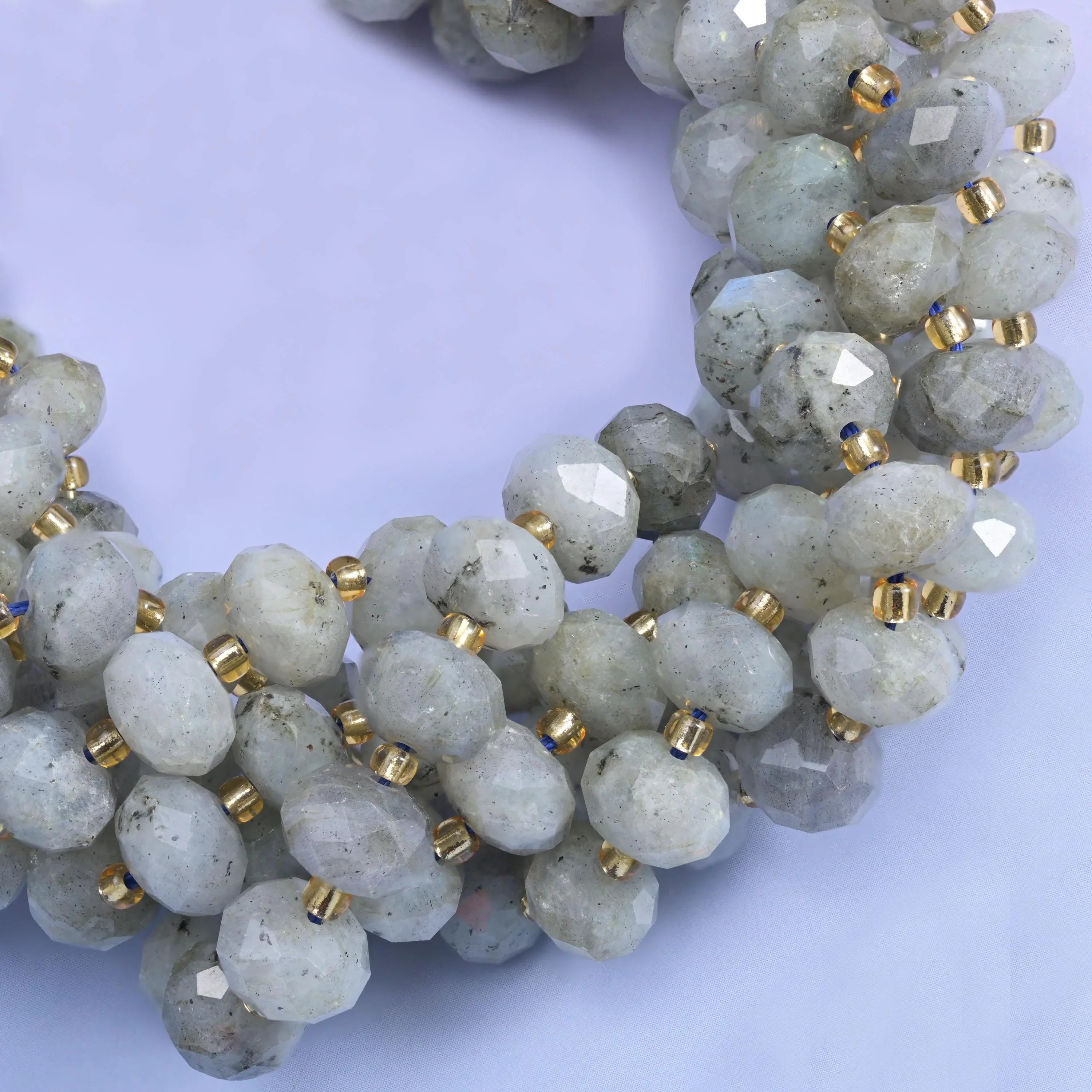 Faceted rondelle cut white labradorite beads