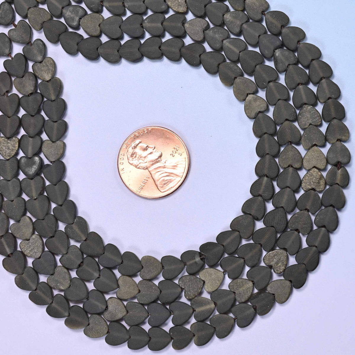 Matte Gold Obsidian Flat Heart Beads, approximately 68 beads per strand