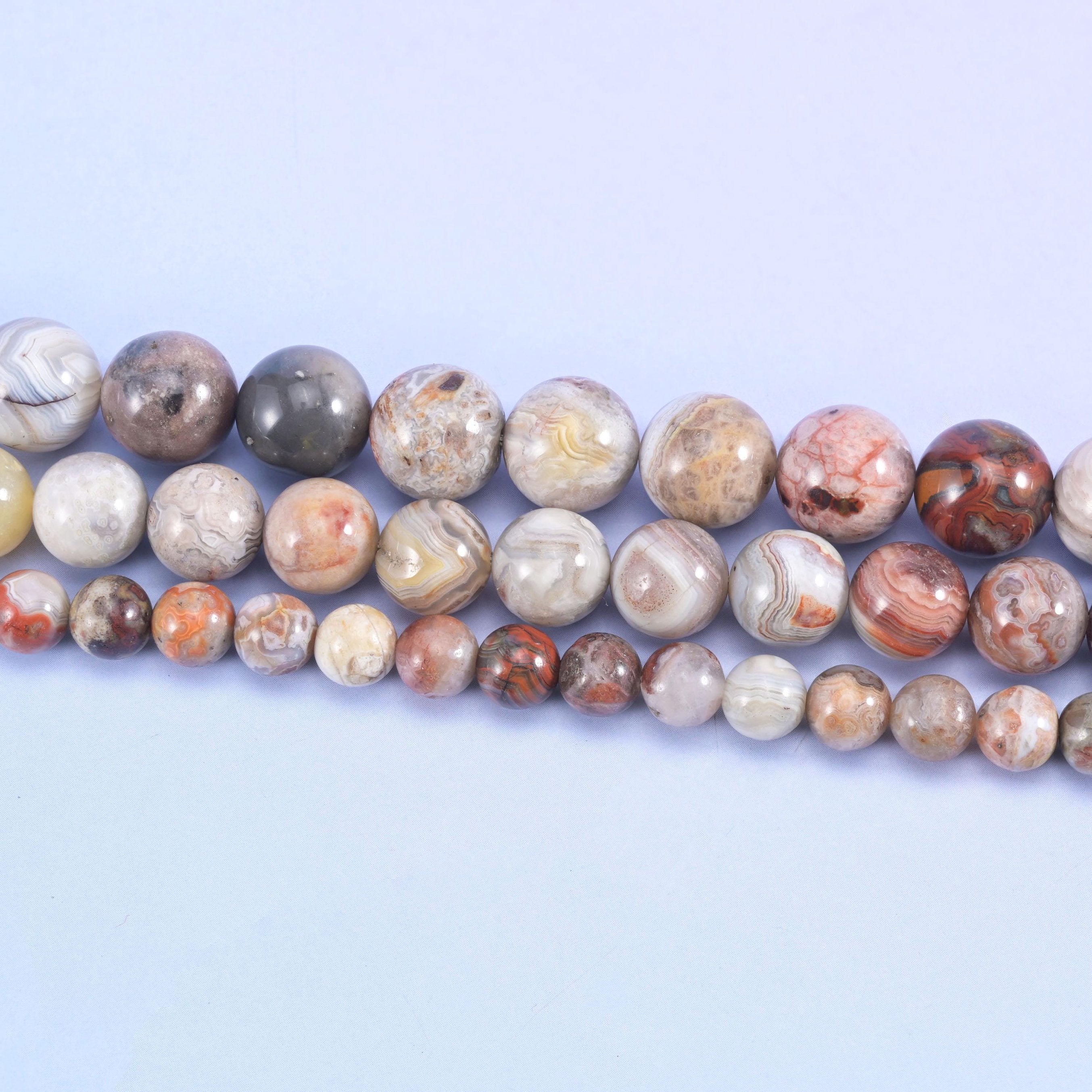 Mexican Crazy Agate round beads in cream, warm grey and rust red
