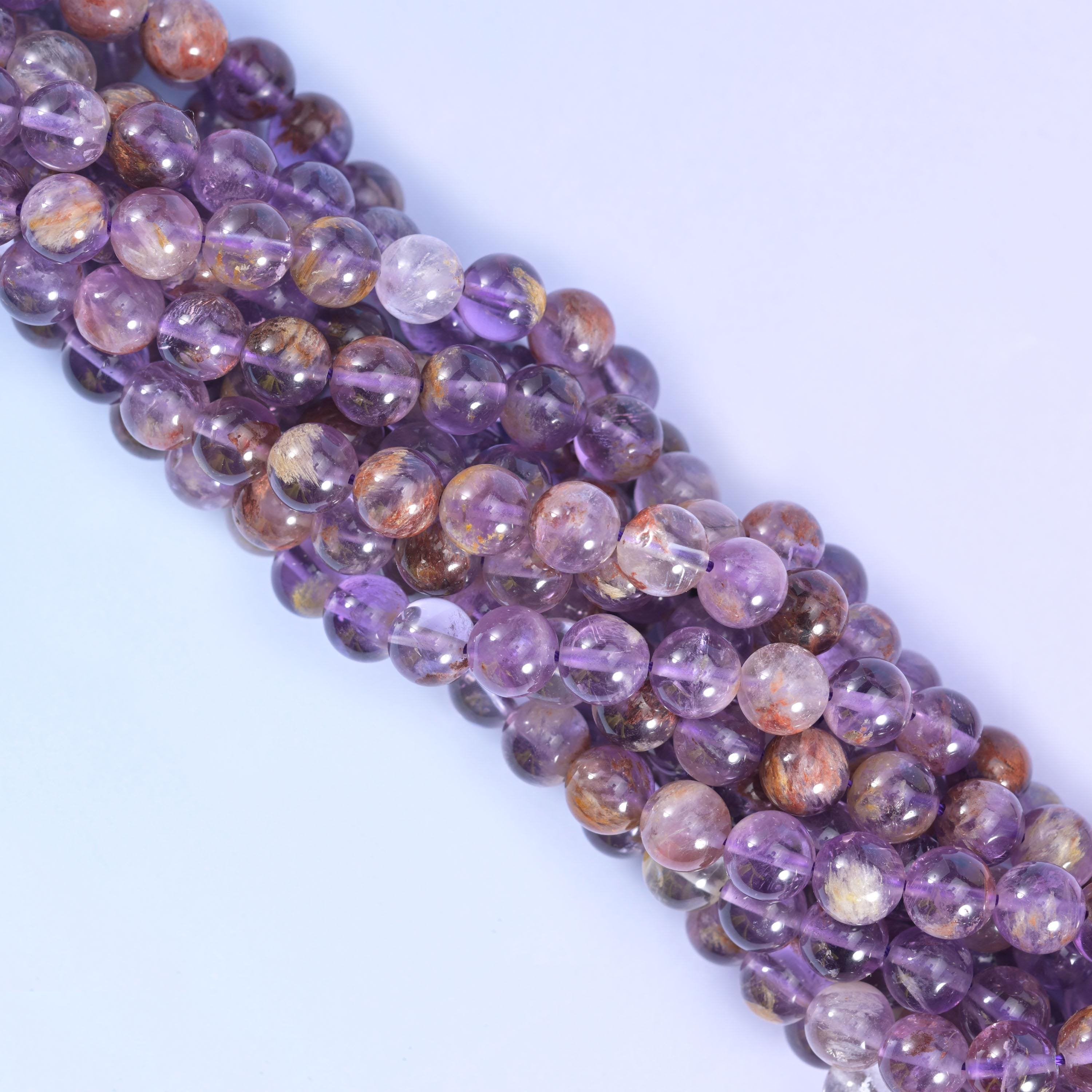 Super 7 purple phantom round beads, approximately 48 beads per 15.5 inch strand
