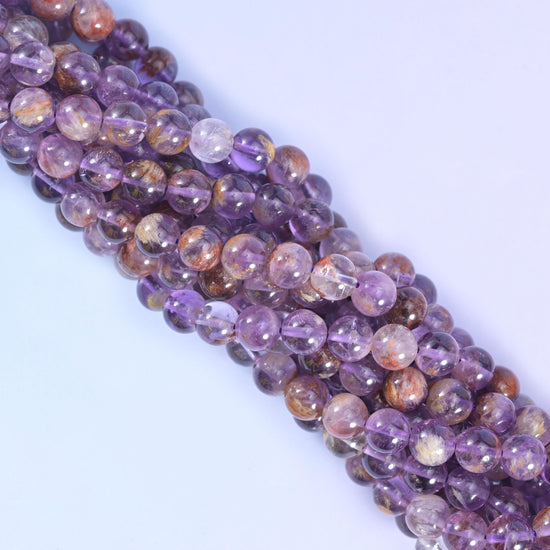 Super 7 purple phantom round beads, approximately 48 beads per 15.5 inch strand
