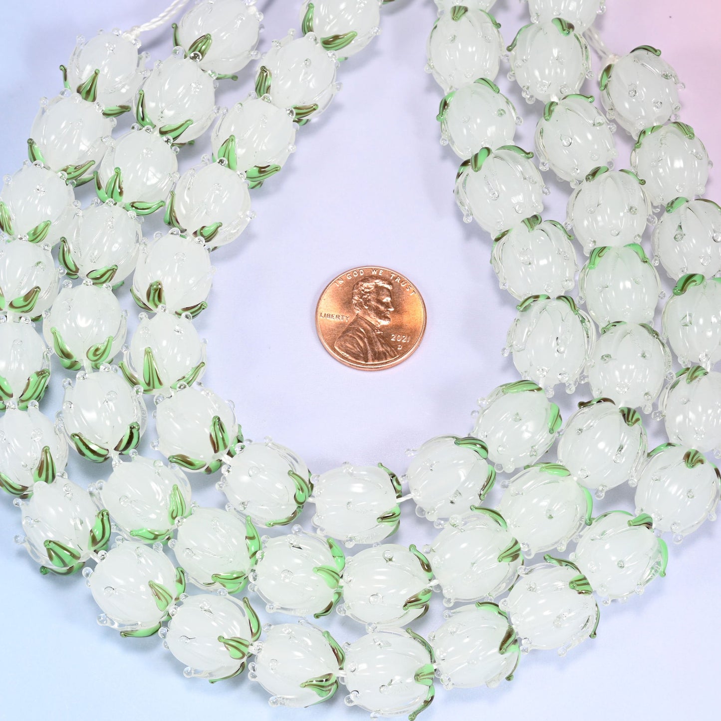 White tulip flower bud lampwork glass beads, approximately 20 beads per strand