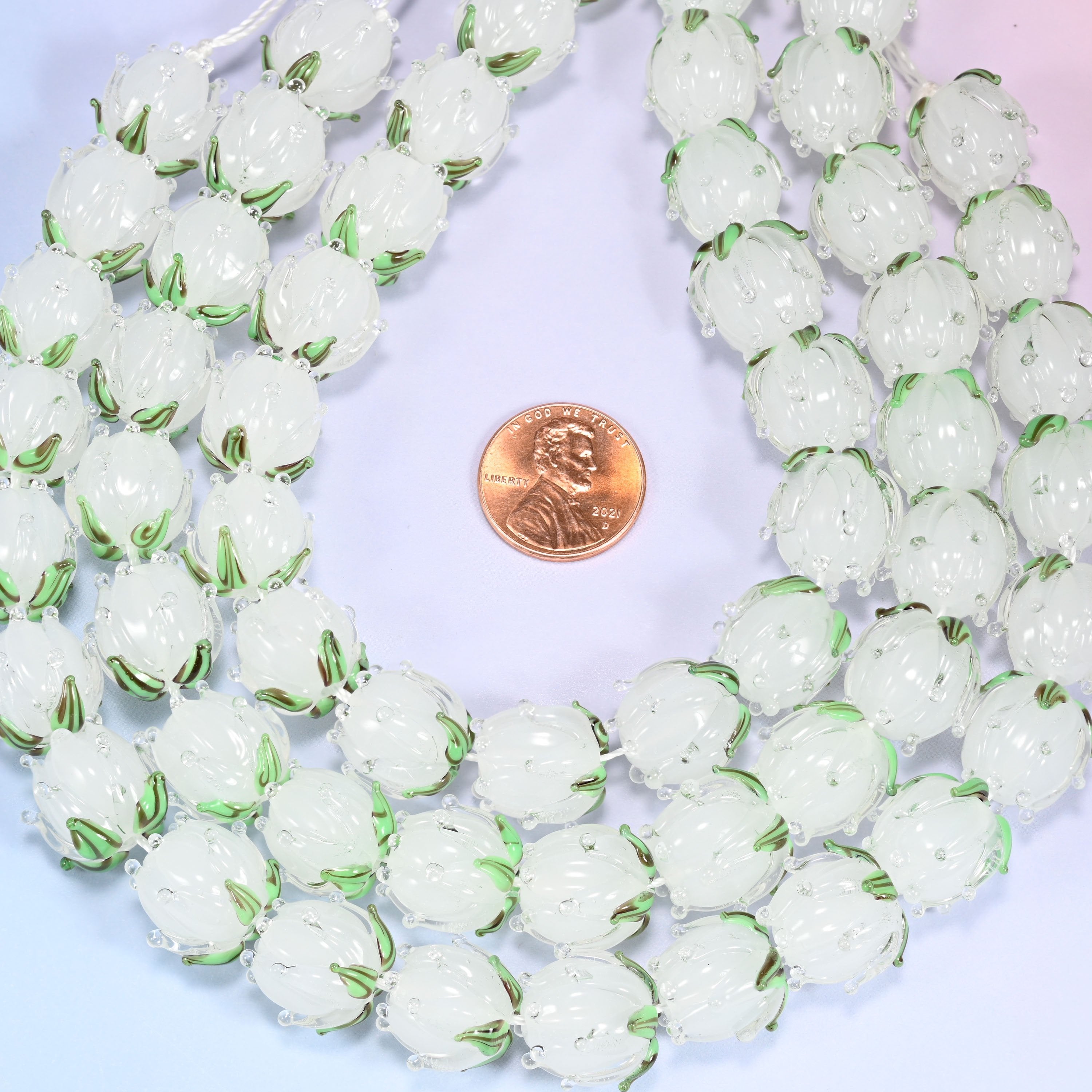 White tulip flower bud lampwork glass beads, approximately 20 beads per strand