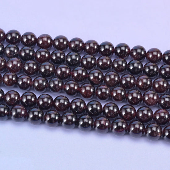 Red Garnet smooth round beads, 15.5 inch strand