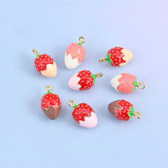 Eight strawberry charms grouped together, two in each dip color: brown, light pink, white and light orange.