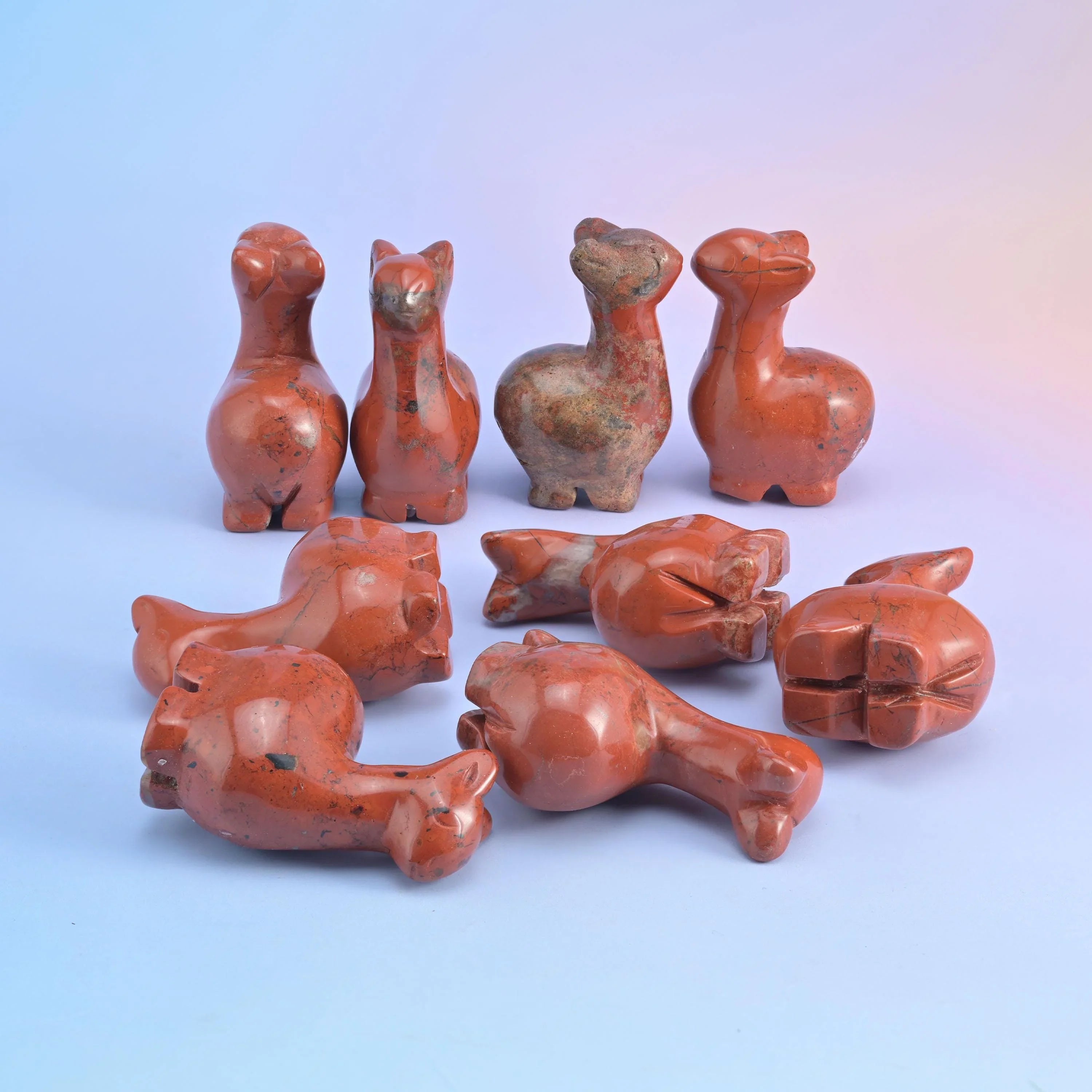 Alpaca carving in a choice of 7 stones including red jasper, tiger eye, sodalite and rose quartz