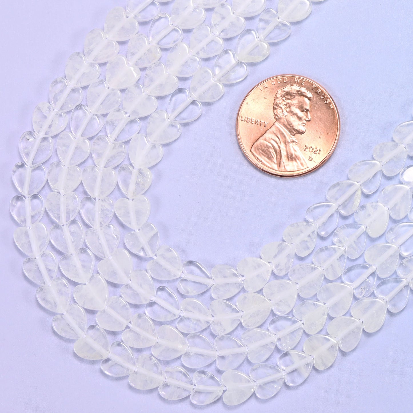 Flat heart cut clear quartz beads