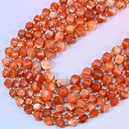 Dyed Red Stripe Agate faceted spiral twist beads, 15 inch strand