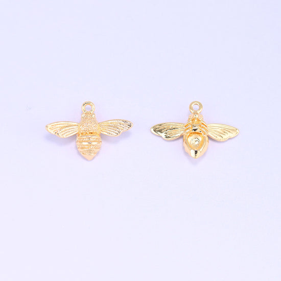 Small gold charms bee, two charms side by side showing the front and back of the 18K gold plated bee