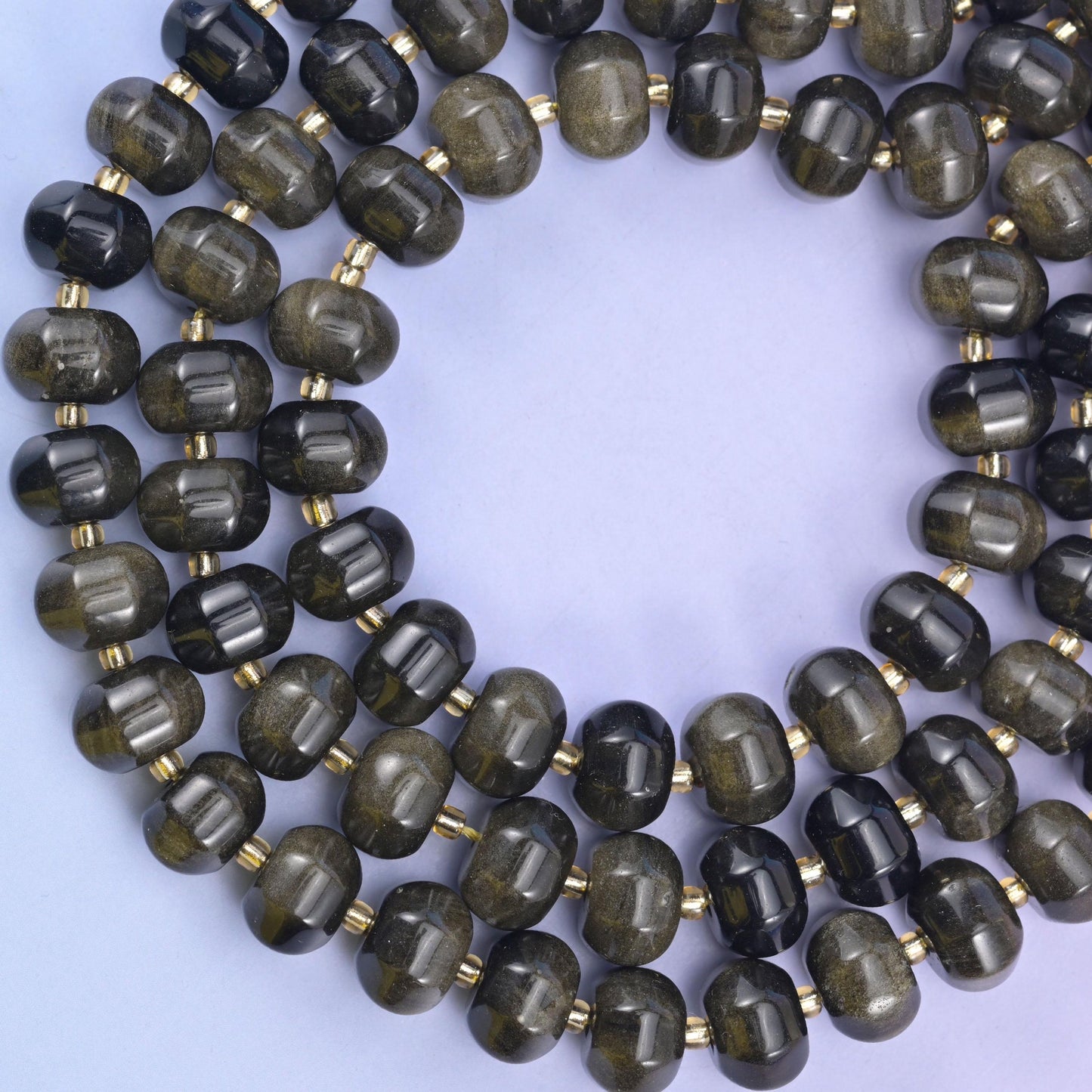 Gold obsidian pumpkin beads, approximately 35 beads per strand