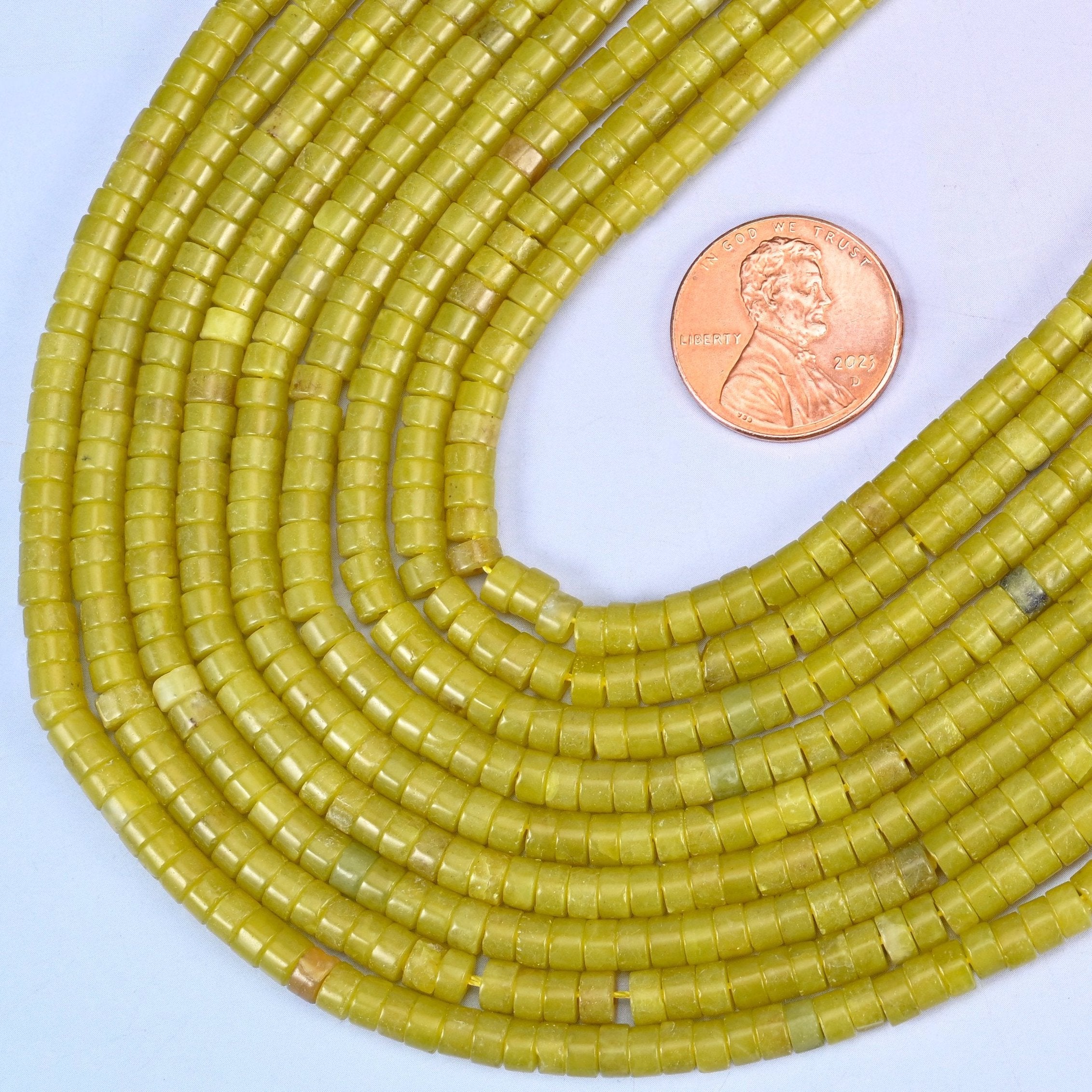 Smooth heishi disc cut Lemon Jade beads