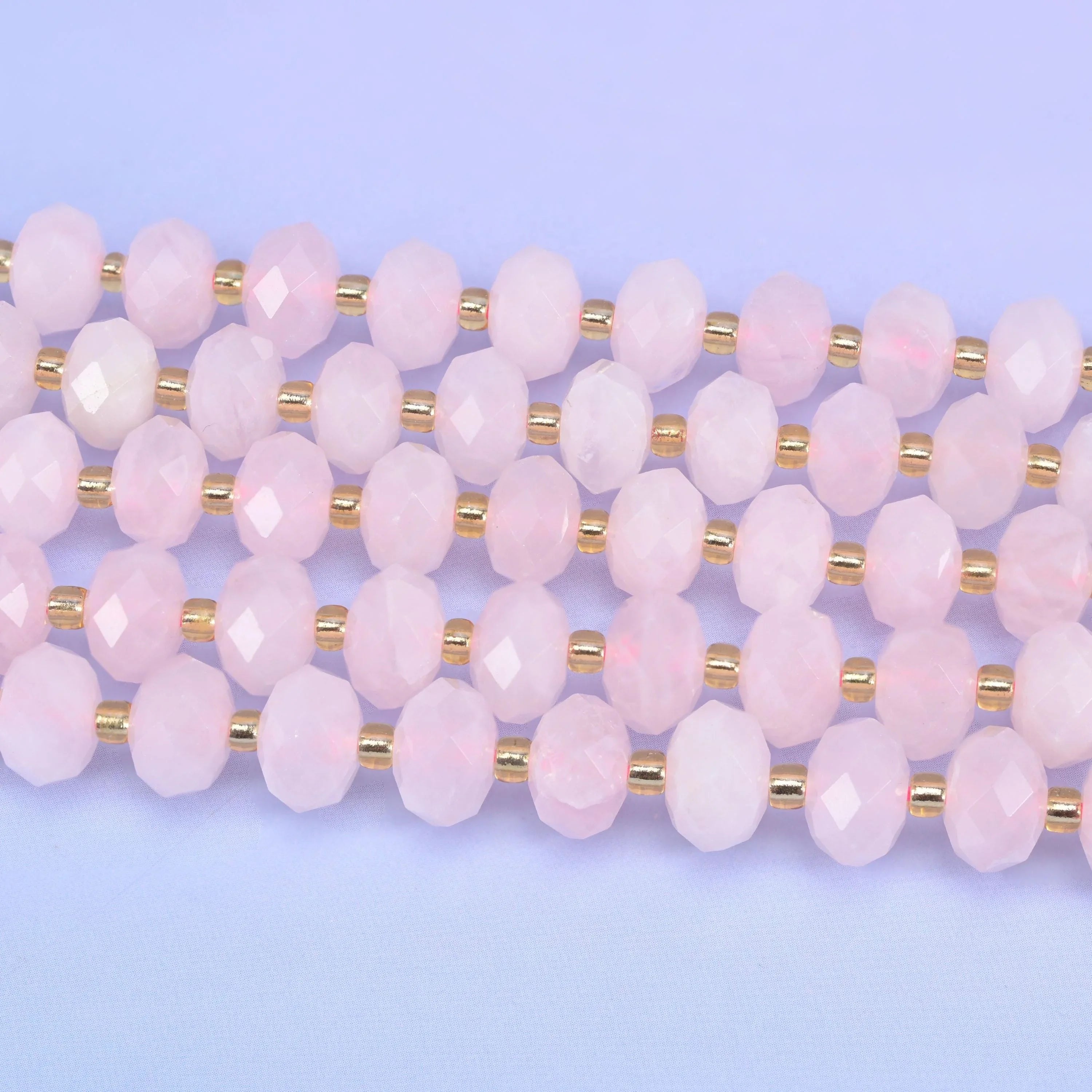 Faceted rondelle cut rose quartz beads