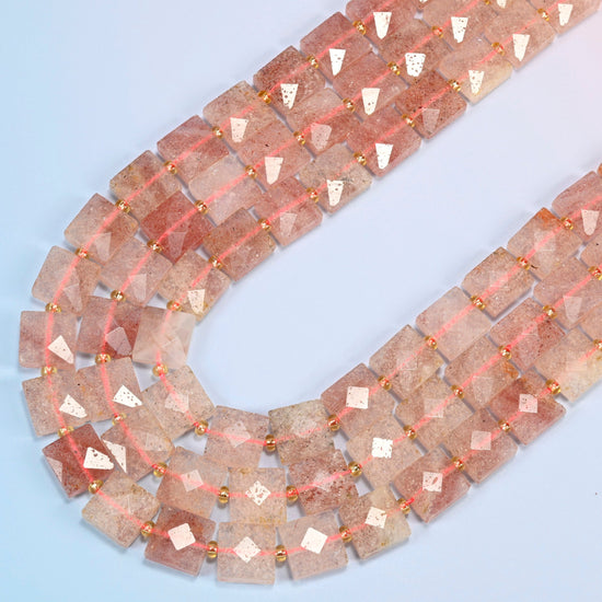 Natural strawberry quartz faceted flat square beads in several strands curved into a wide U, soft pink stone with fine red flecks