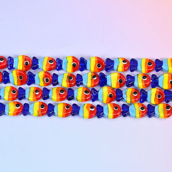 Colorful Striped Fish Glass Beads 19x12mm in banded red, yellow, pale blue and cobalt with a black eye dot