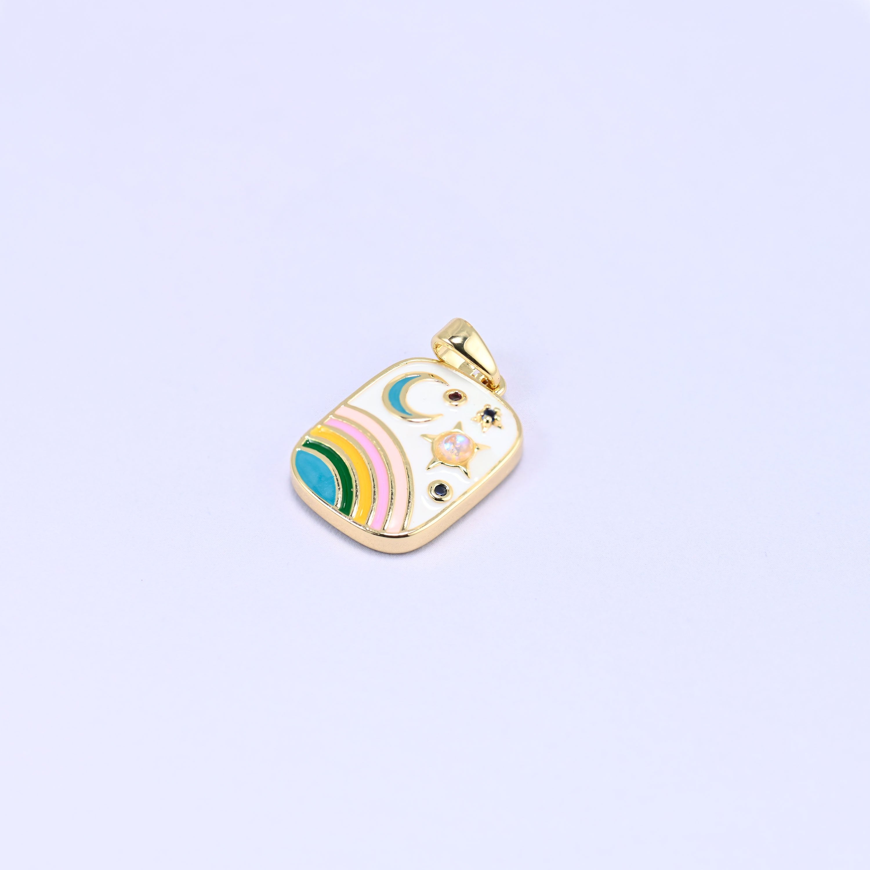 Brass charm with colorful enamel celestial scene and sparkling zircon stars