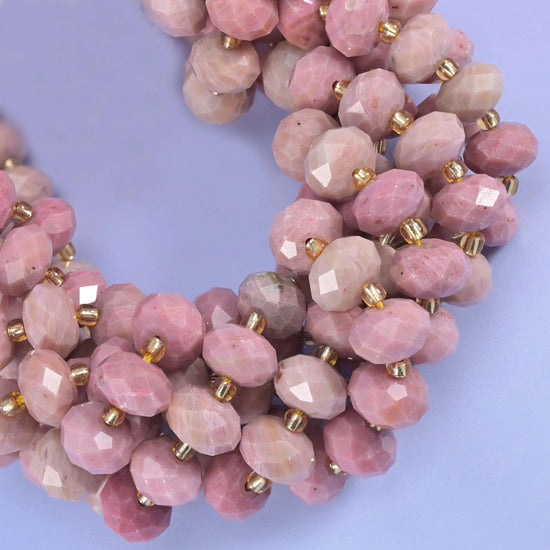 Faceted rondelle cut pink rhodonite beads