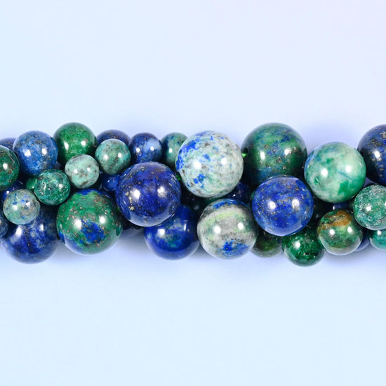 Deep royal blue and forest green marbled together with grey-white matrix, all highly polished