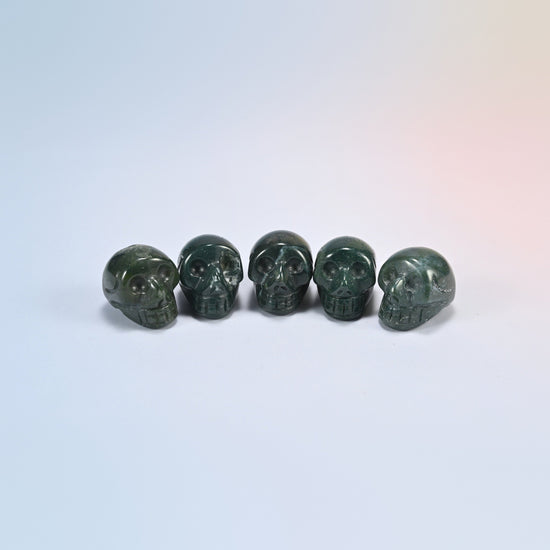 1 inch skull crystal carving in moss agate, green natural stone with moss patterns