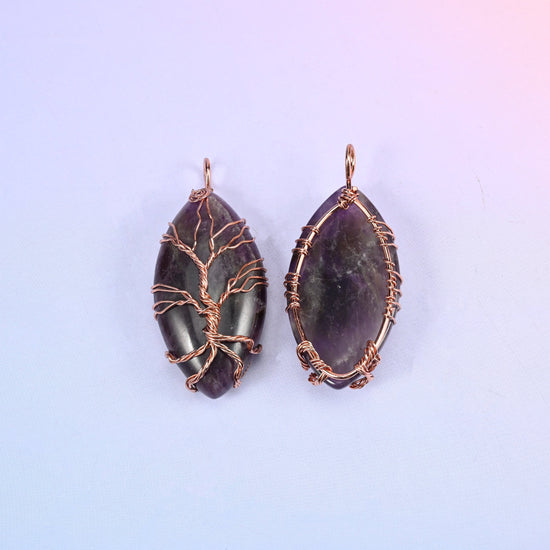 Oval Crystal Pendant with Copper Wired Tree in purple, front view beside the reverse so the wrapped bail and edge wiring can be compared.