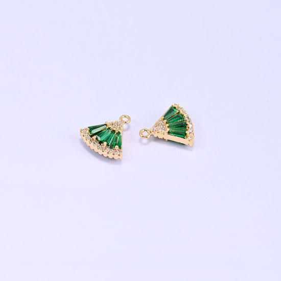 Small gold charms, two fan charms with one turned to show the back