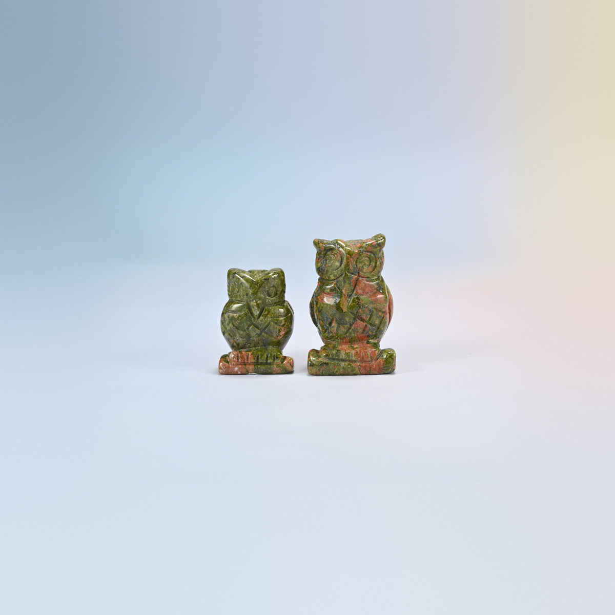 Owl crystal carving in unakite, green and salmon pink natural stone