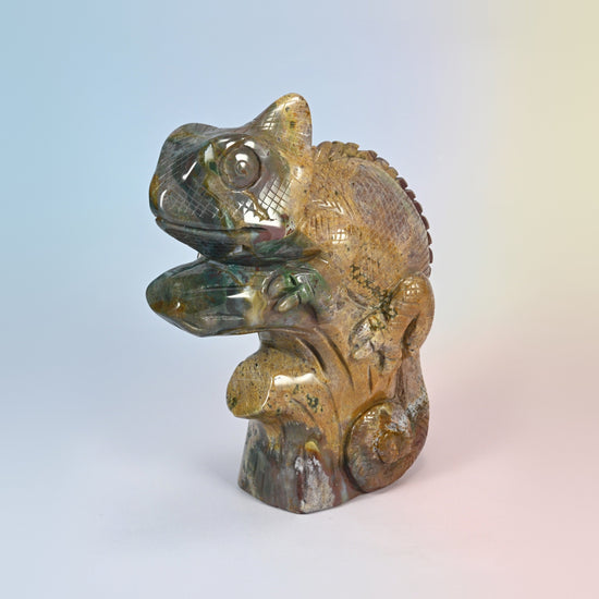 Front three-quarter view of the natural ocean jasper chameleon with green spotted head